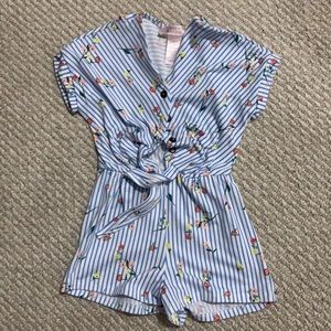 Size 4 (girls) romper. Brand new. Never worn.